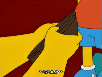 gif of Homer Simpson opening an empty wallet and groaning
