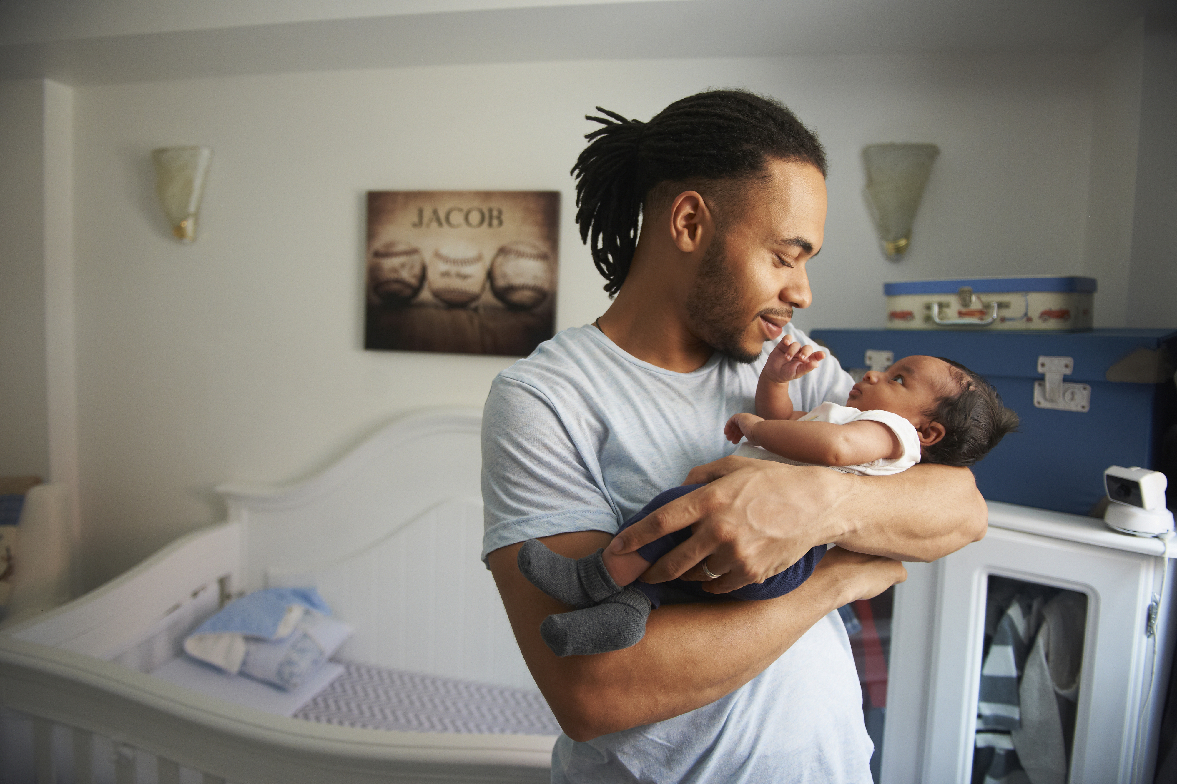 a man holding a baby