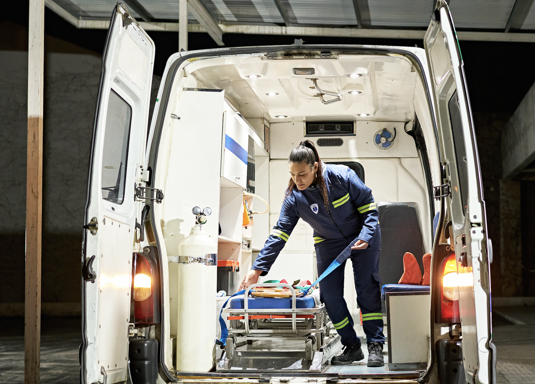 EMT organizing an ambulance