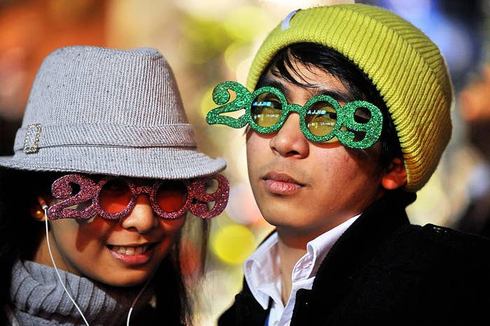 two people wearing 2009 glasses