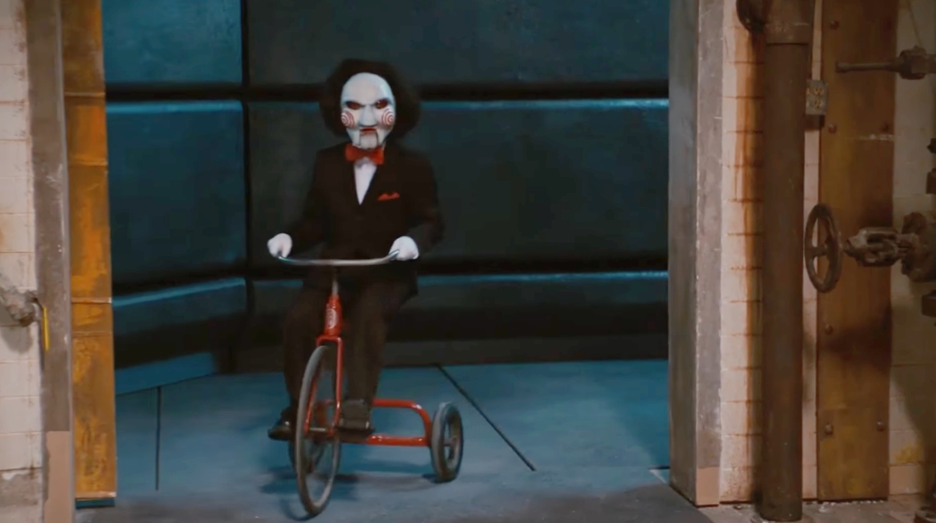 Jigsaw from &quot;Scary Movie 4&quot; is riding a tricycle