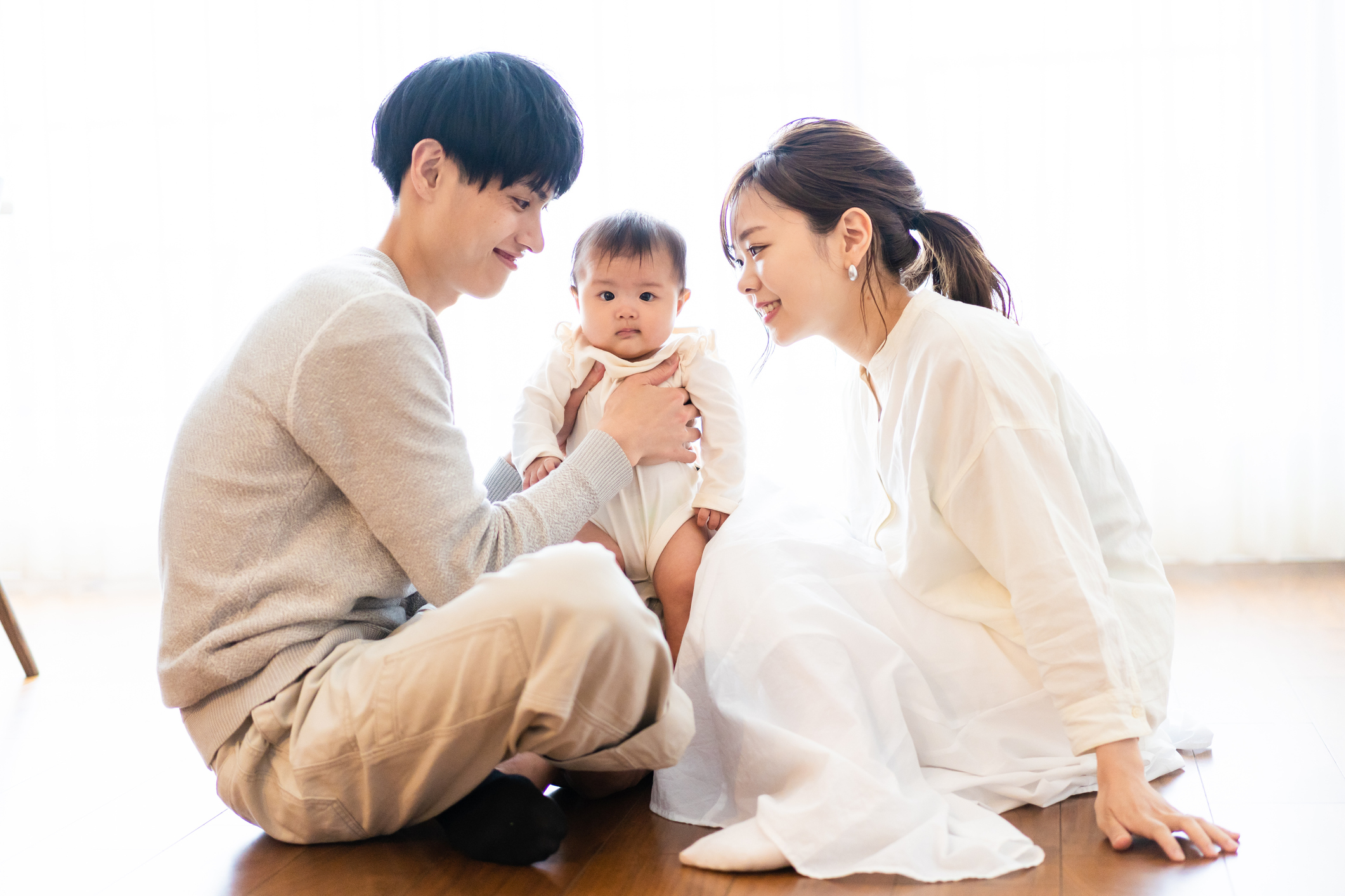family sitting on the floor
