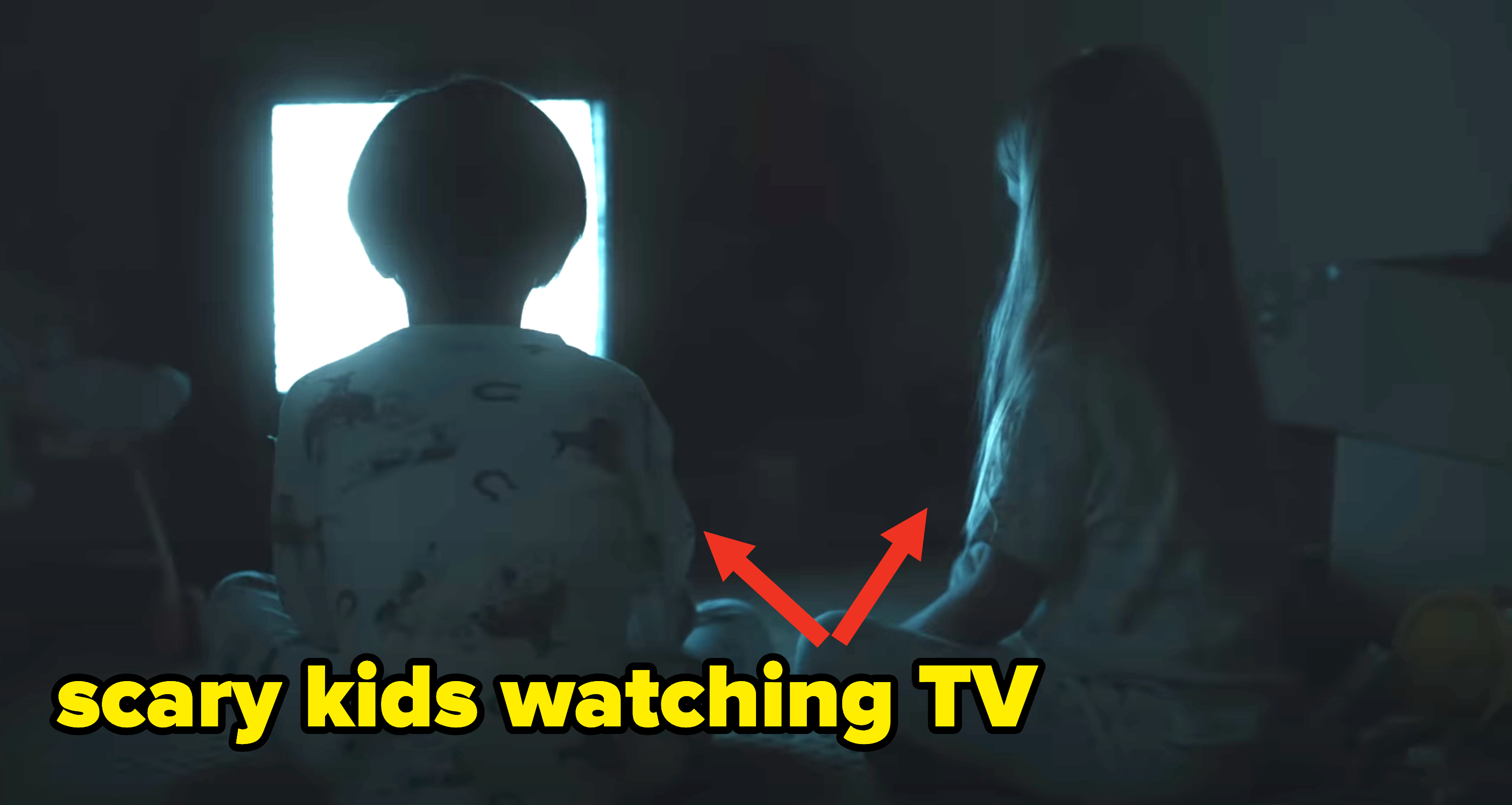 Two kids watching a TV in the dark, with caption &quot;scary kids watching TV&quot;