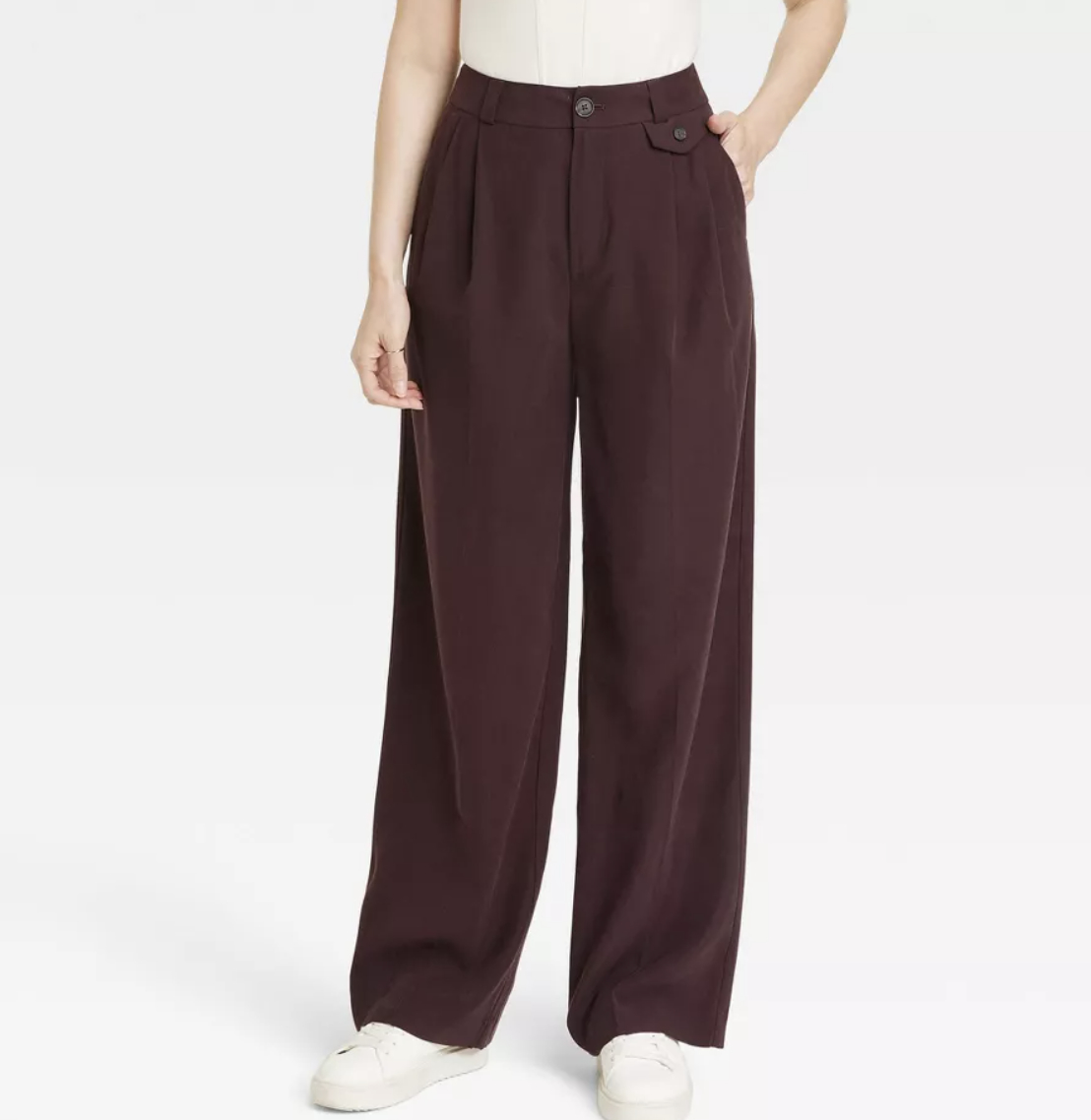 A pair of brown wide leg trousers