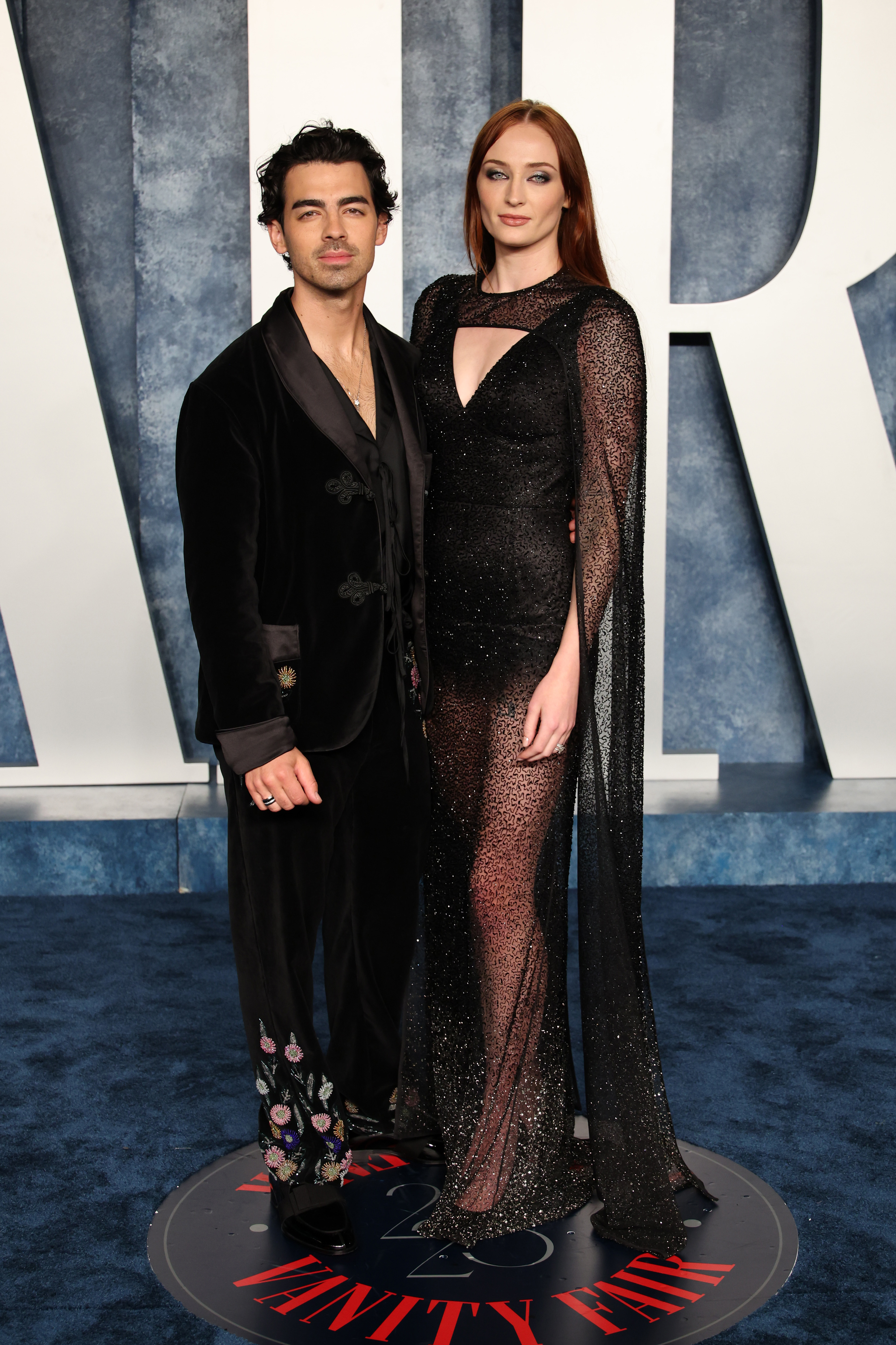 Closeup of Joe and Sophie posing for photographers at a media event