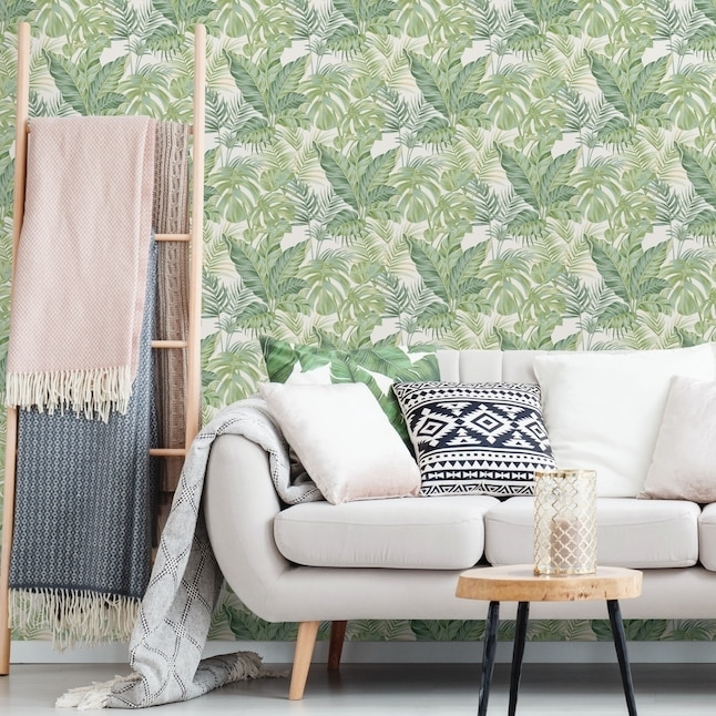 Green foliage wallpaper in a living room