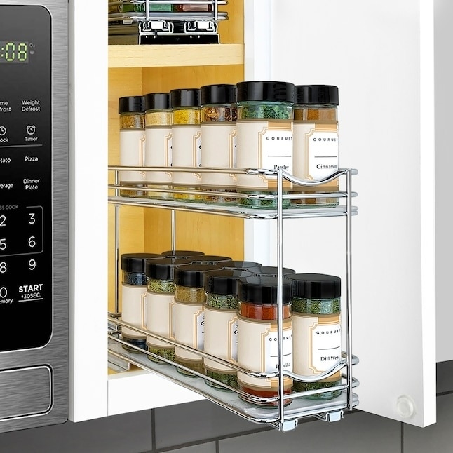 the spice rack with two tiers mounted in a cabinet