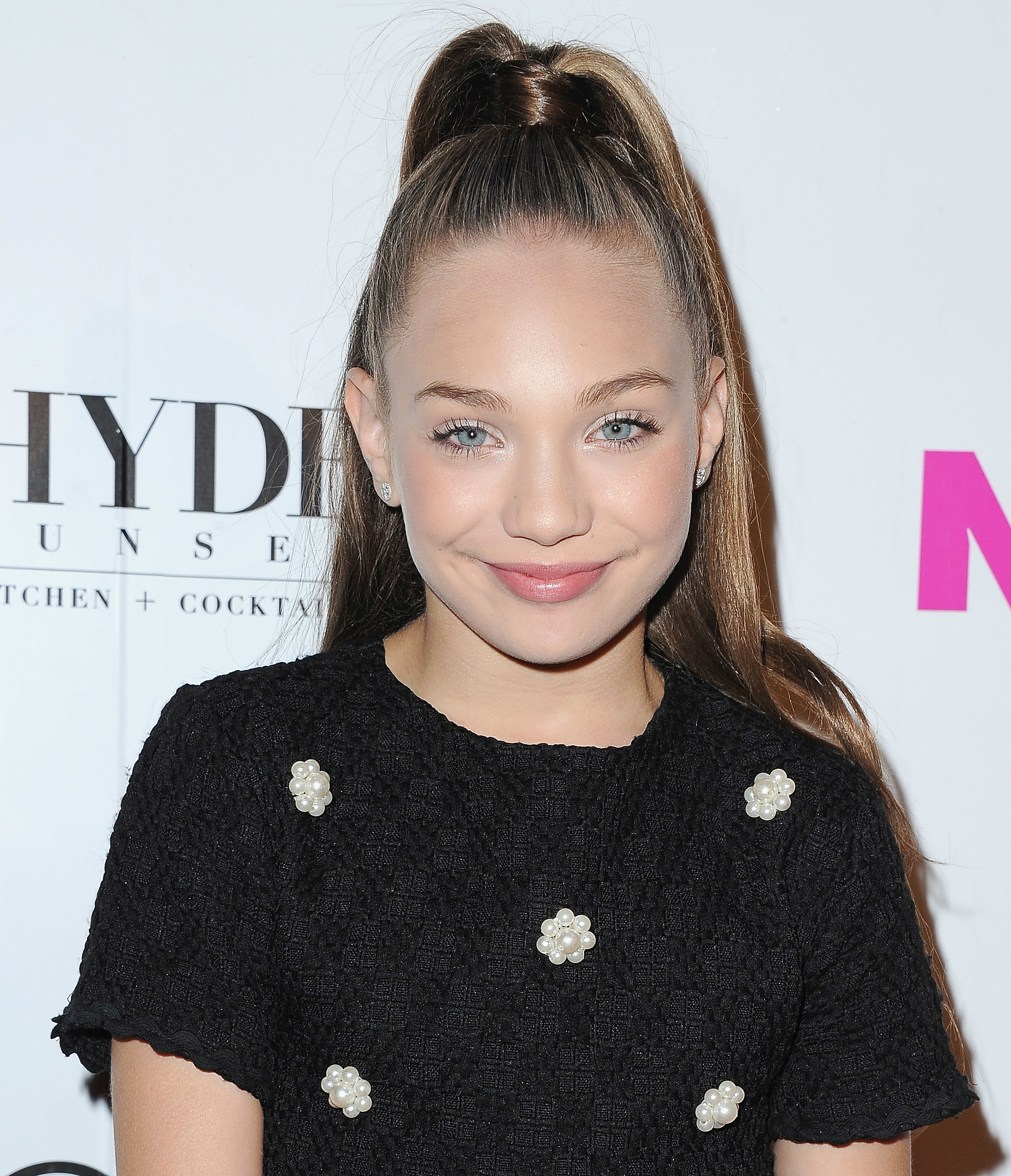 Close-up of Maddie at a media event