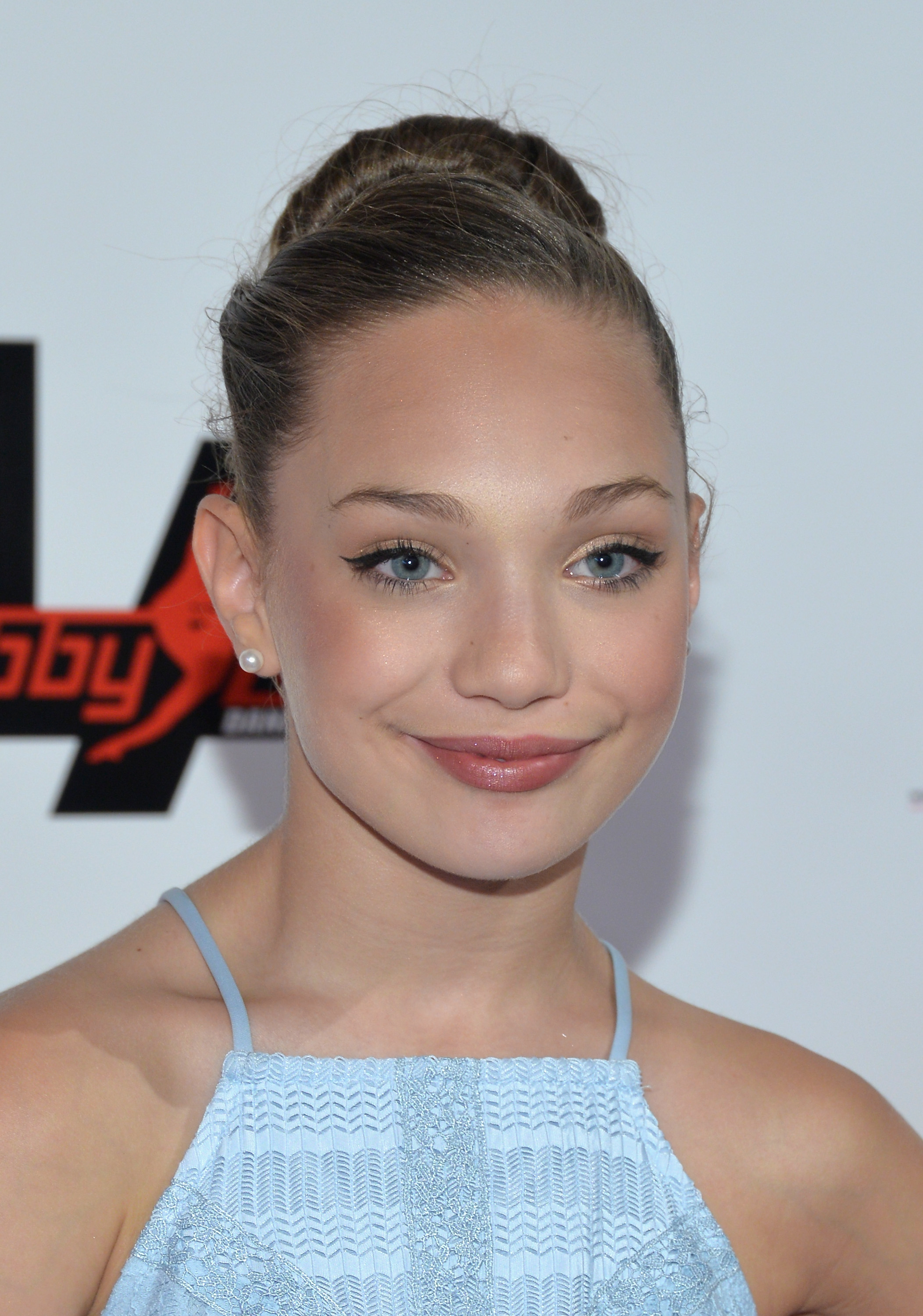 Close-up of Maddie at a media event