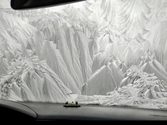windshield looks like it&#x27;s got a mountain landscape drawn on it