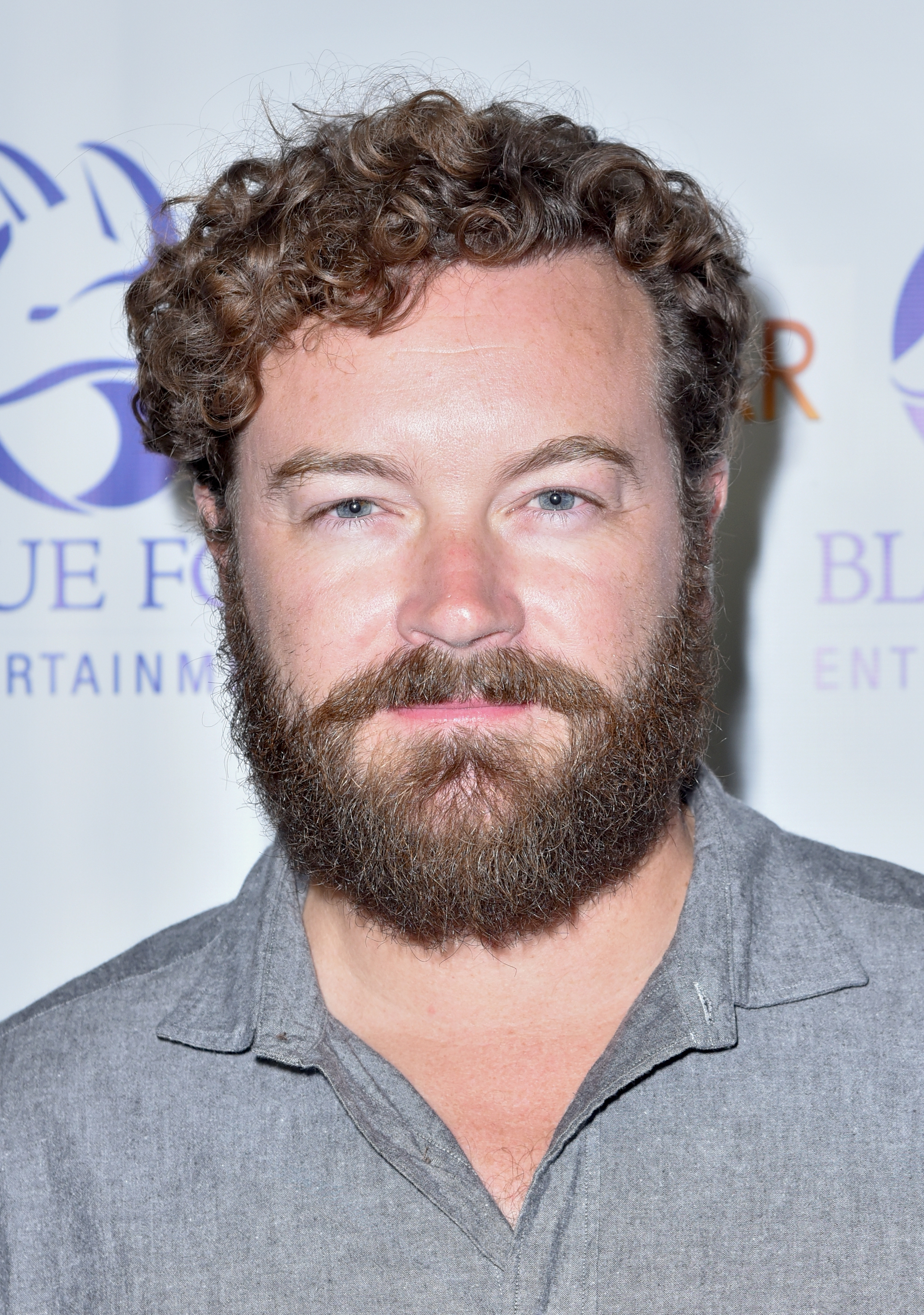 A closeup of a bearded Danny Masterson