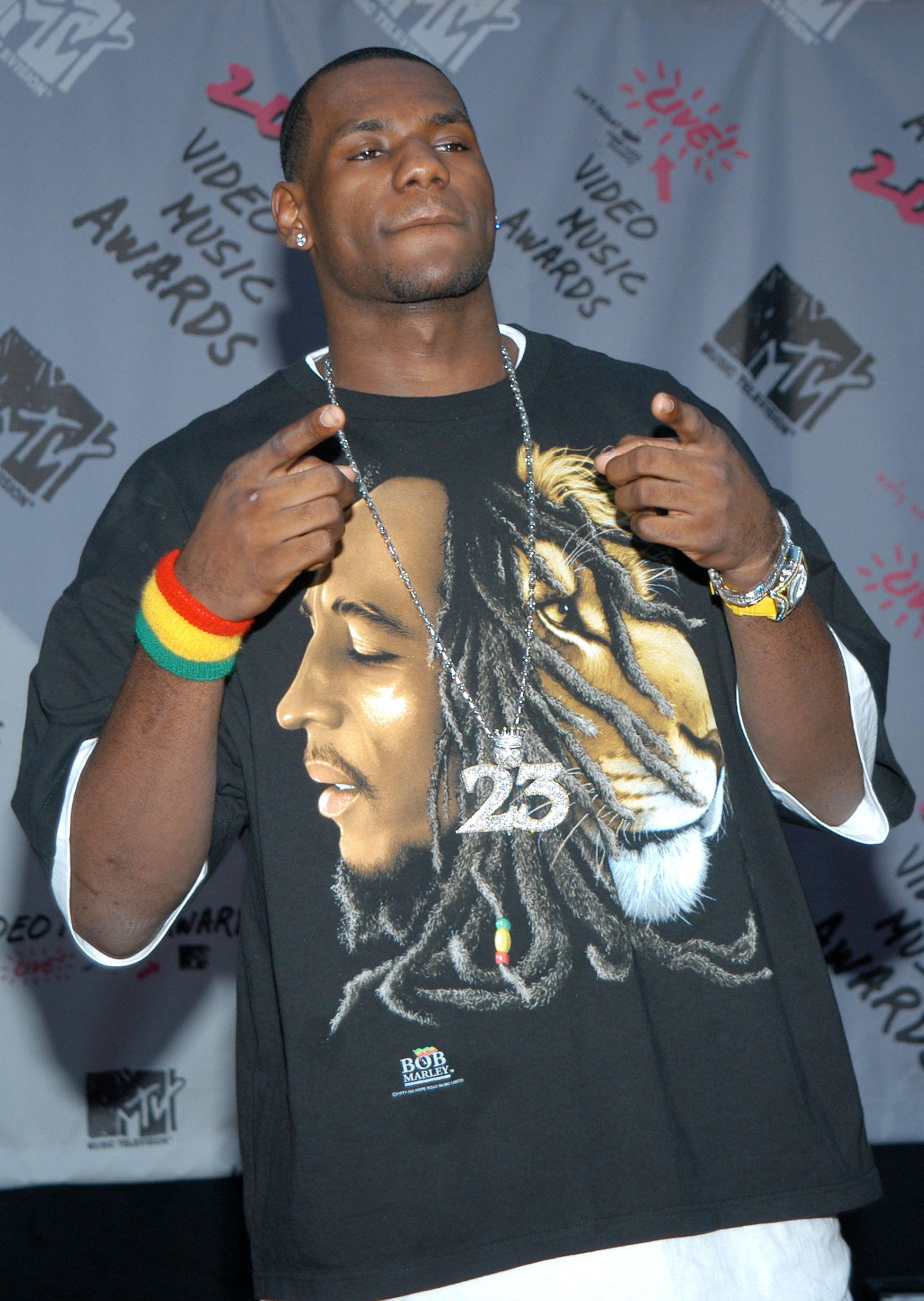 closeup of him wearing a graphic tee