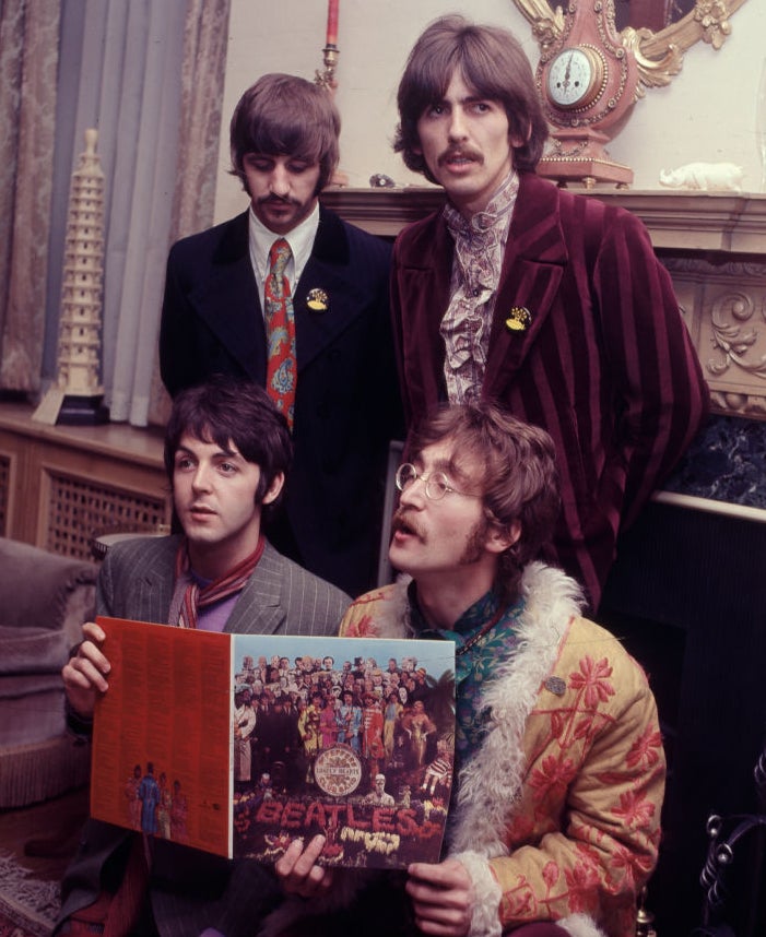 the beatles in a living room with the release of their new album