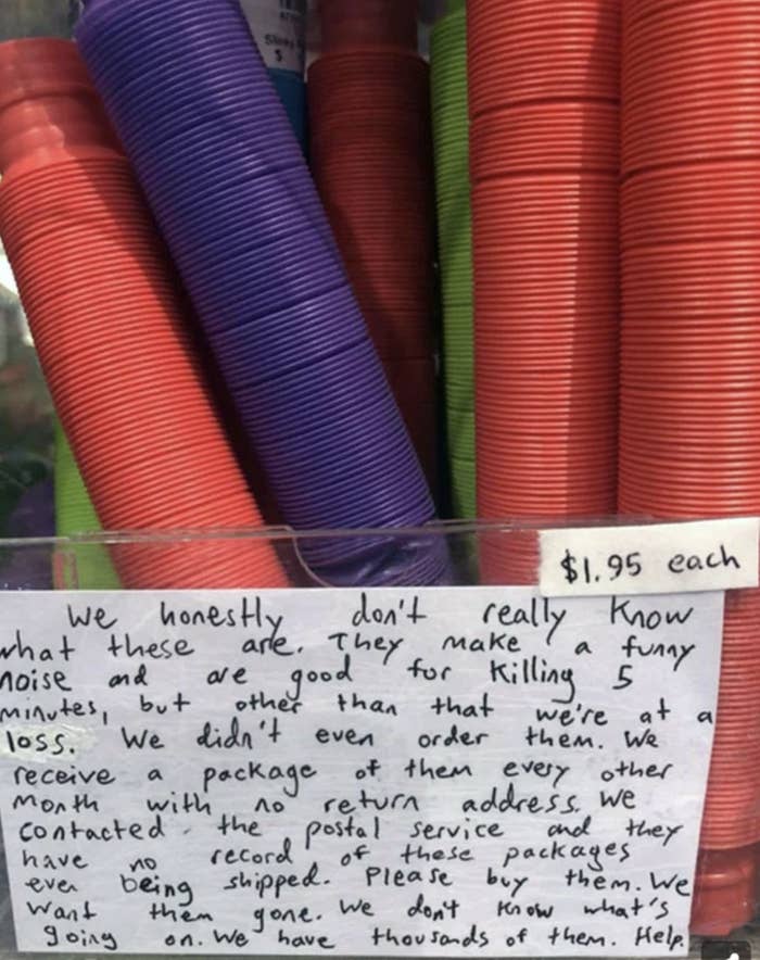 A long, handwritten note begging customers to buy these $2 thin, round, multicolored items that the store can&#x27;t identify (but may be noise-makers) and doesn&#x27;t know who orders them, but they keep coming every other month