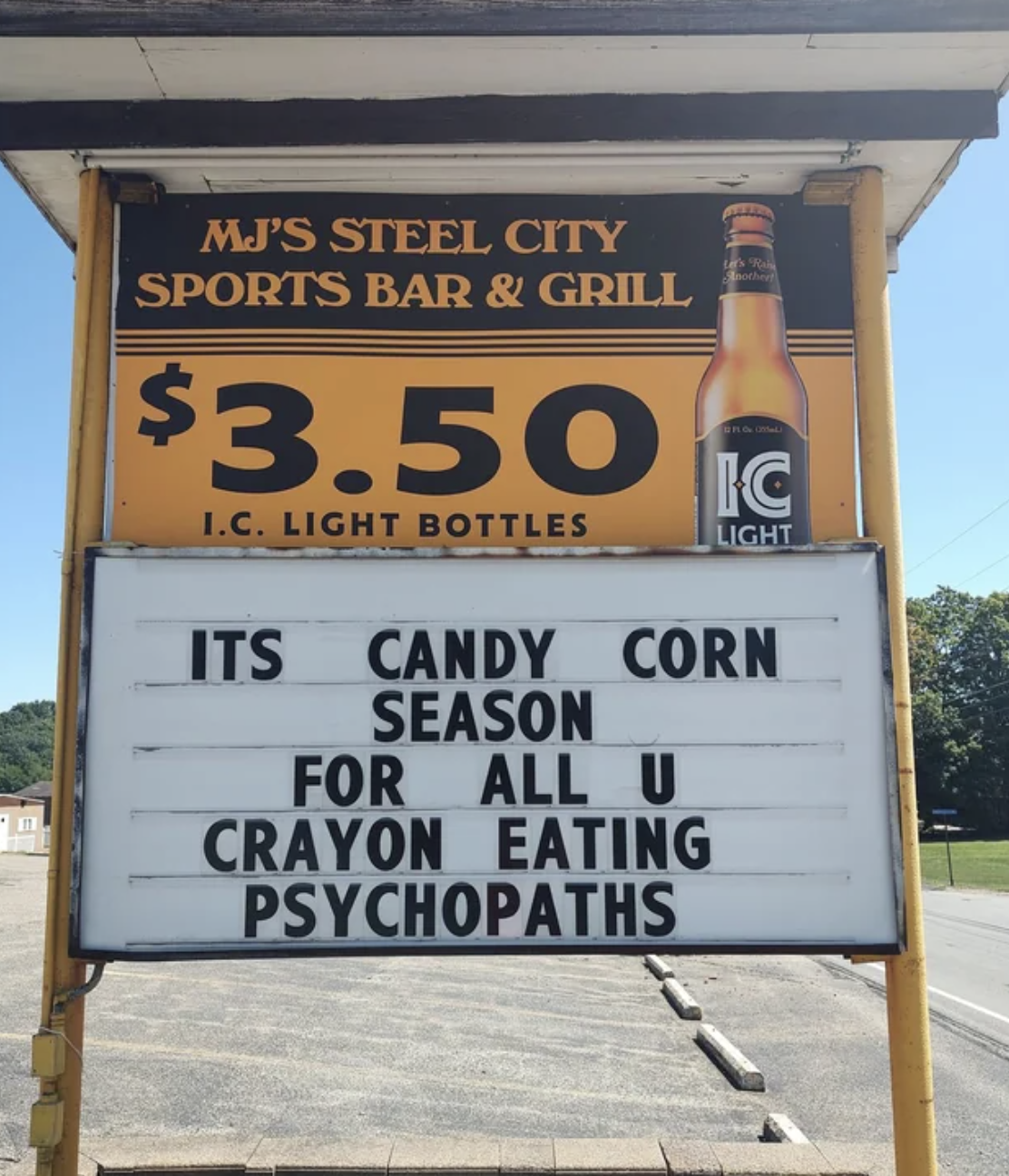 Store sign for MJ&#x27;s Steel City Sports Bar &amp;amp; Grill: &quot;It&#x27;s candy corn season for all u crayon eating psychopaths&quot;