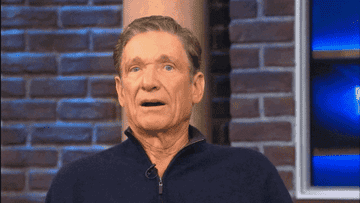 Maury putting his hands on his cheeks
