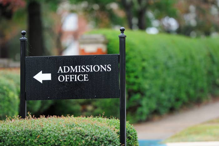 "Admissions office" sign at a public university campus