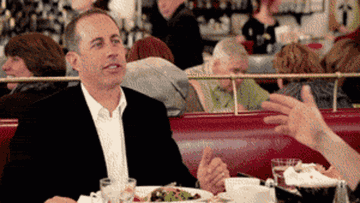 Jerry Seinfeld at a restaurant checks the bill and is shocked at the price.
