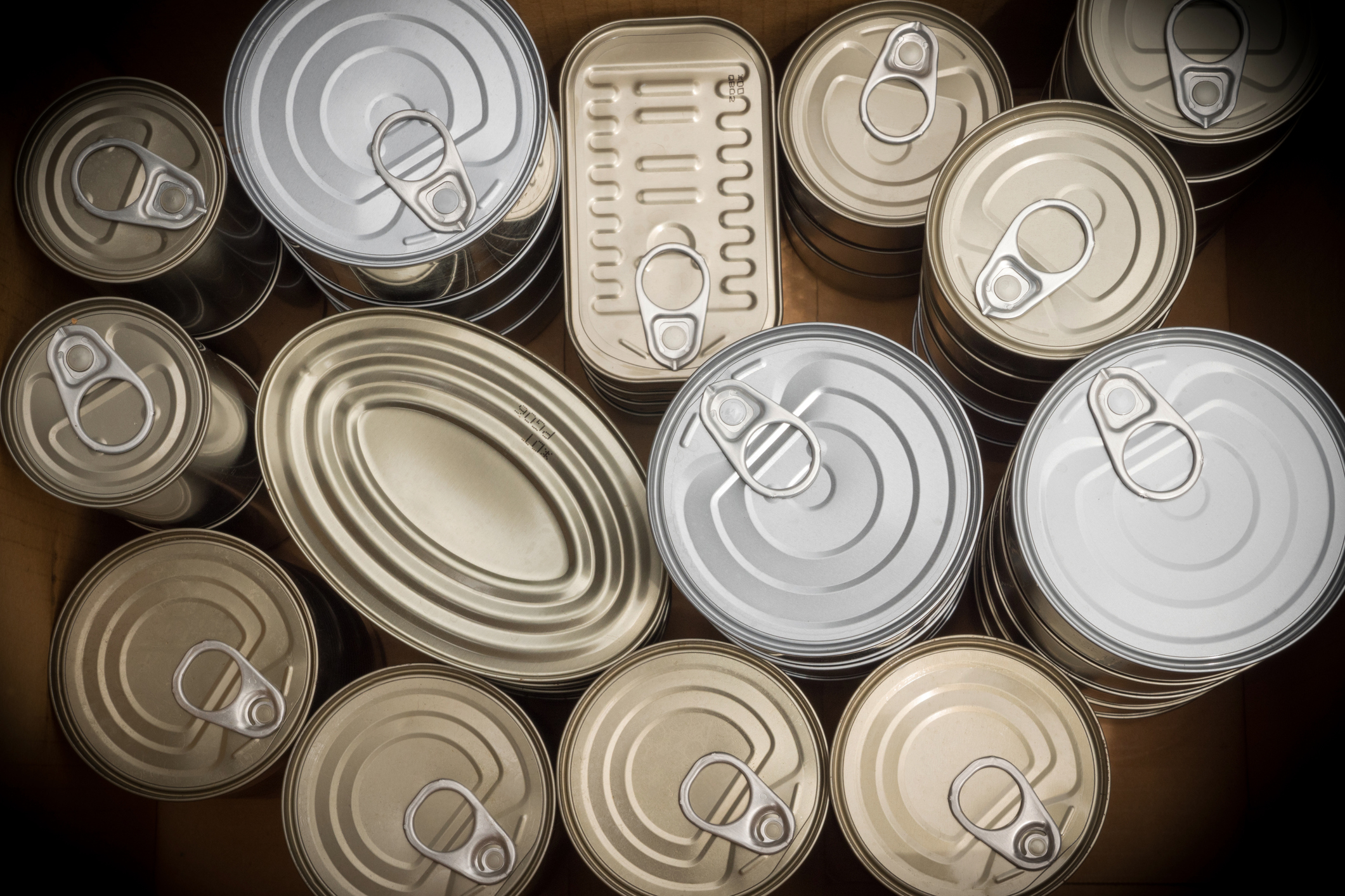 the tops of cans