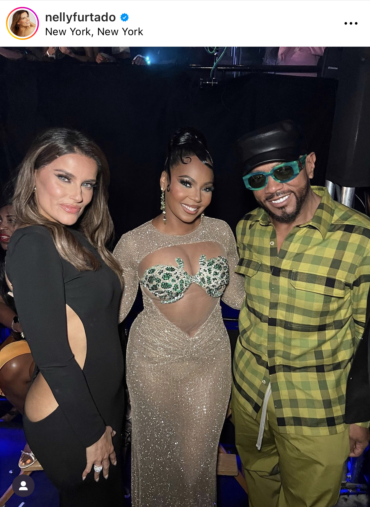From left: Nelly Furtado, Ashanti, and Timbaland pose backstage.