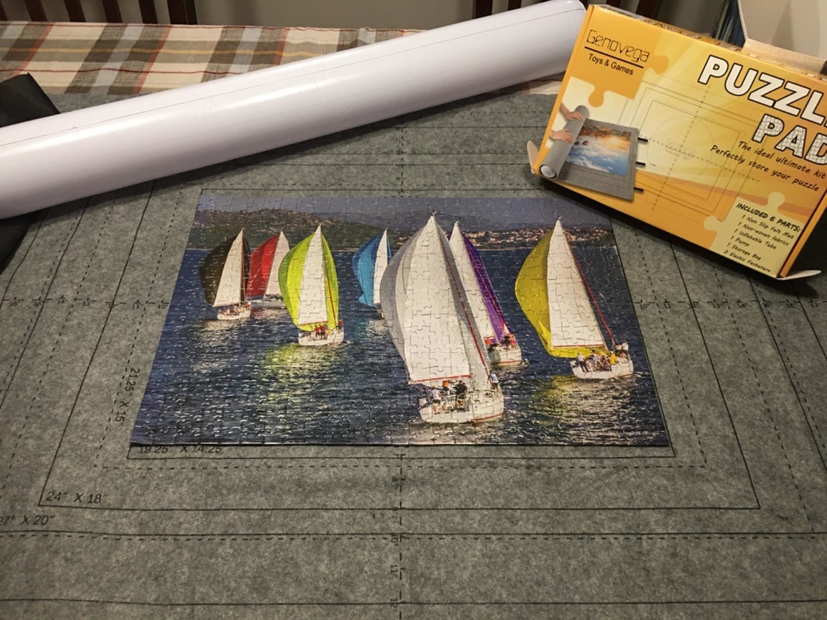 Reviewer image of a completed puzzle on the gray puzzle pad