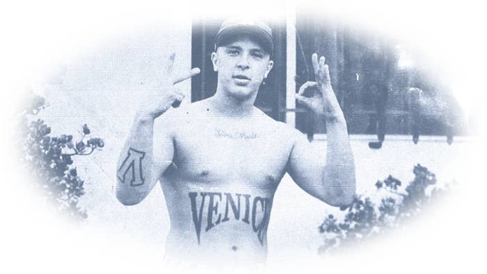 Spanto shirtless with Venice tattoos