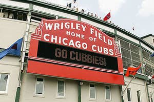 Wrigley Field sign that says "Go Cubbies" in lights.