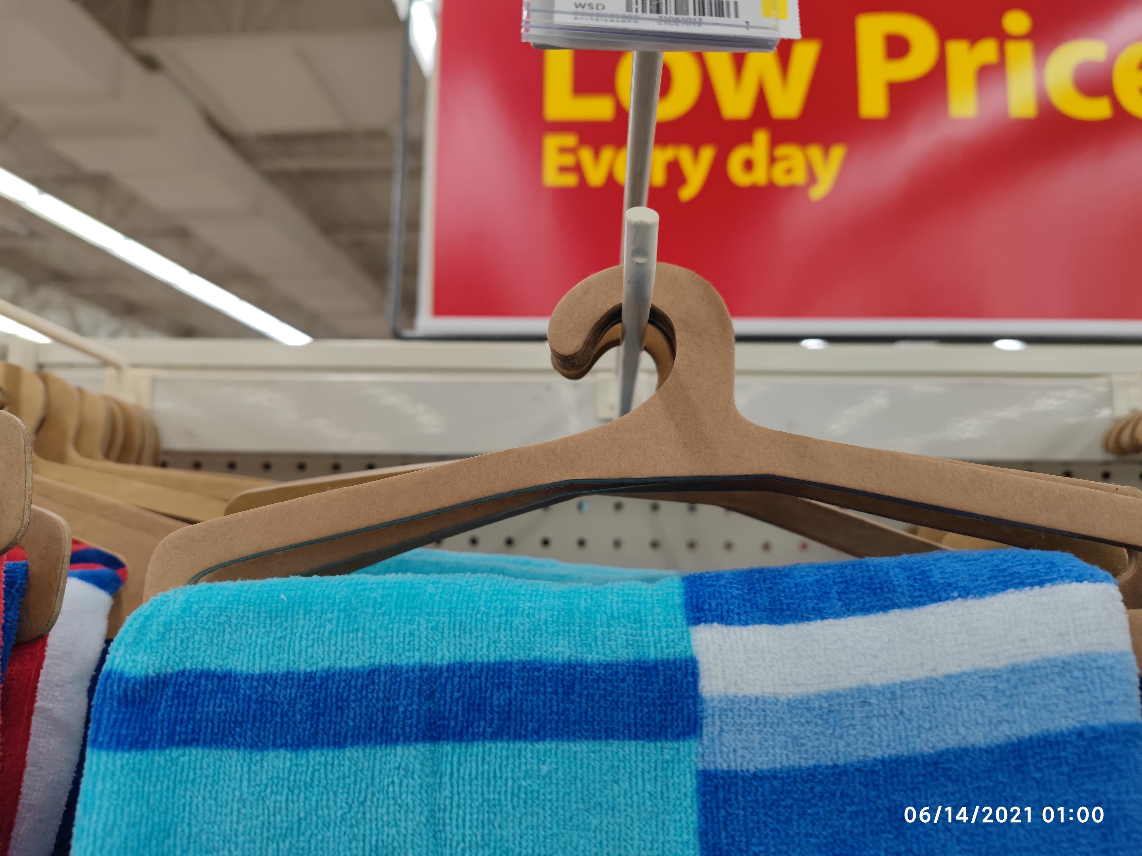 towels on a cardboard hanger