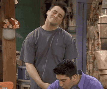 Joey from "Friends" hugs Ross lovingly.