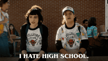 Two kids from Stranger Things sit outside and say &quot;I hate high school.&quot;