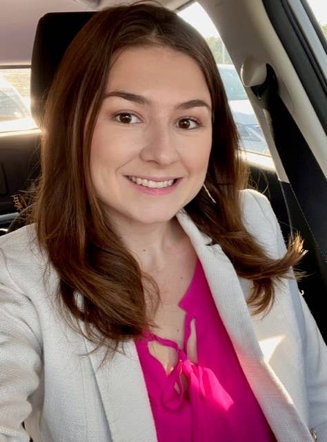 selfie of Alexa wearing a blazer in her car
