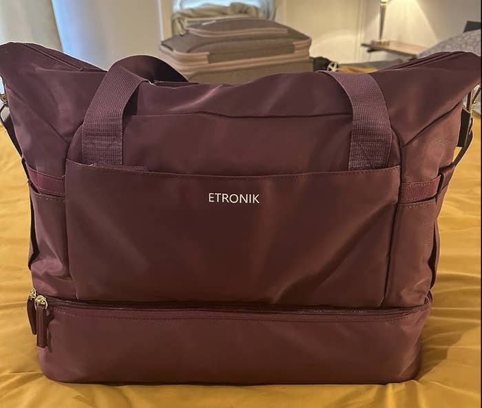 reviewer photo showing the bag in maroon