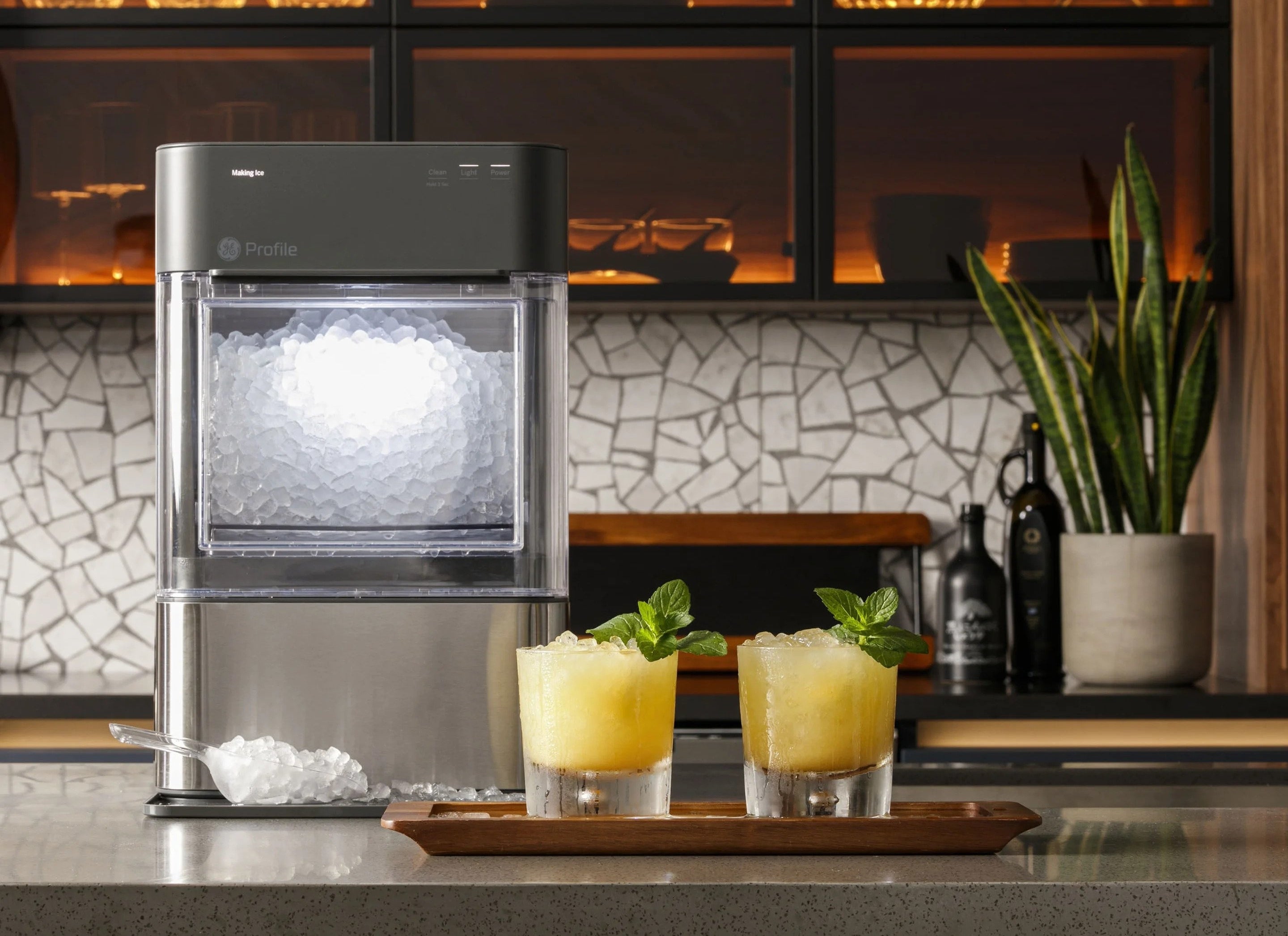 The ice maker with a transparent bin and stainless steel finish