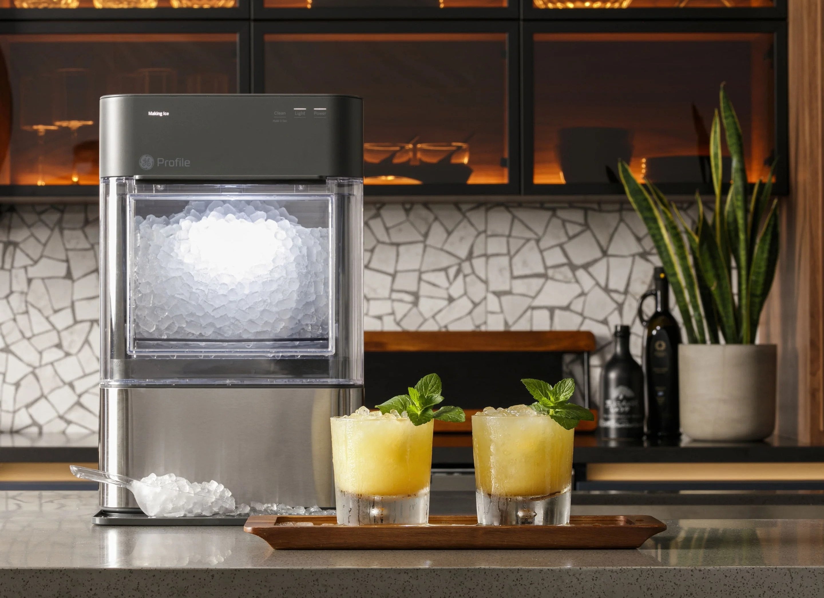 The ice maker with a transparent bin and stainless steel finish