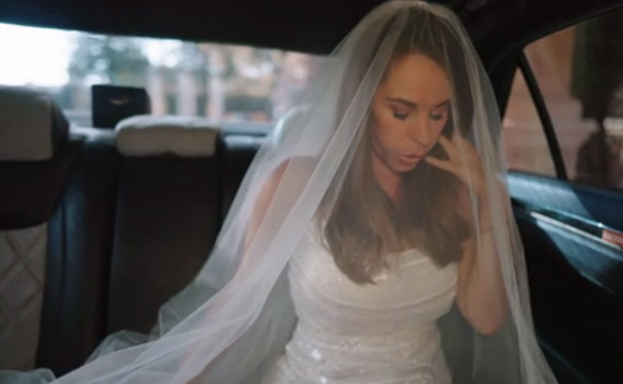 bride riding in a car