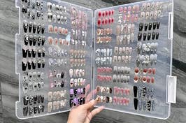 open plastic container with lots of various press on nails stored