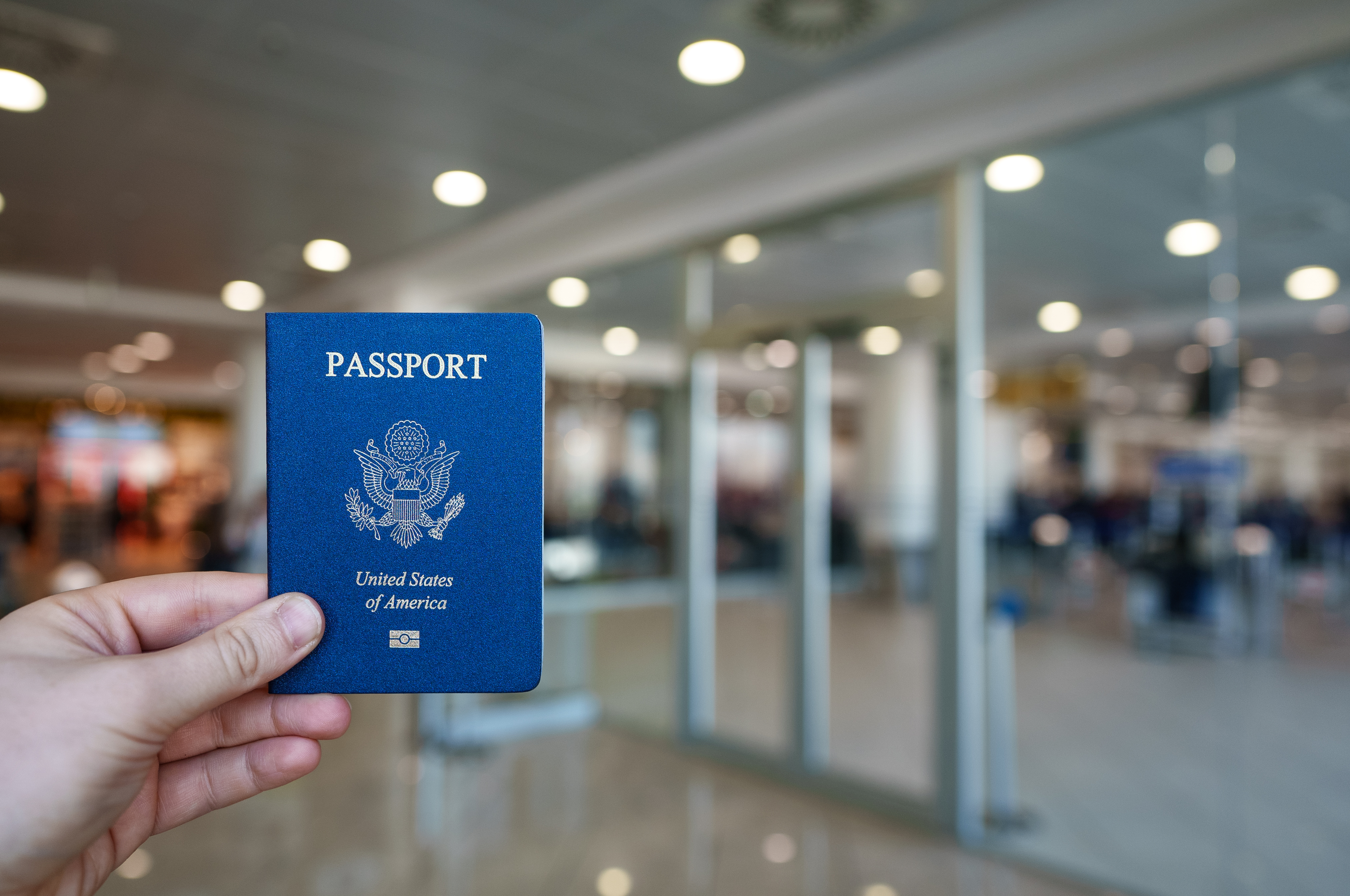 someone holding an american passport