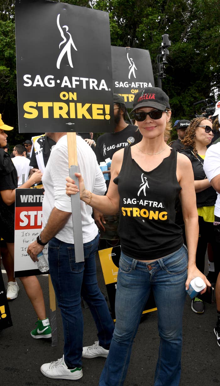A person on the picket line wearing a &quot;SAG-AFTRA Strong&quot; T-shirt