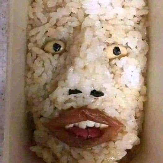 face made of food in the rice