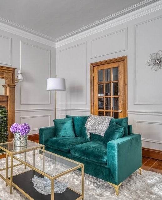 a reviewer photo of the green loveseat