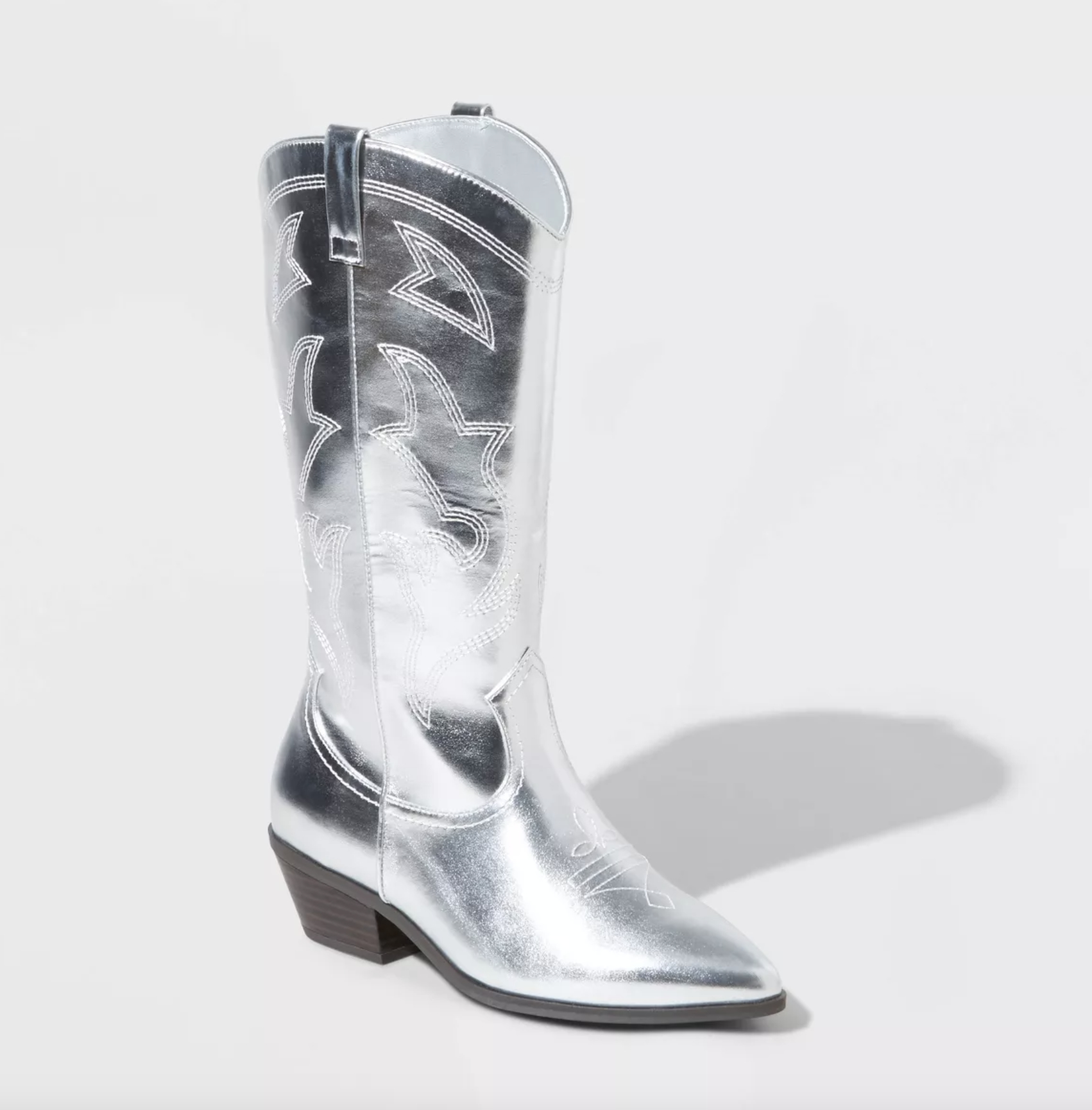 the cowboy boots in silver