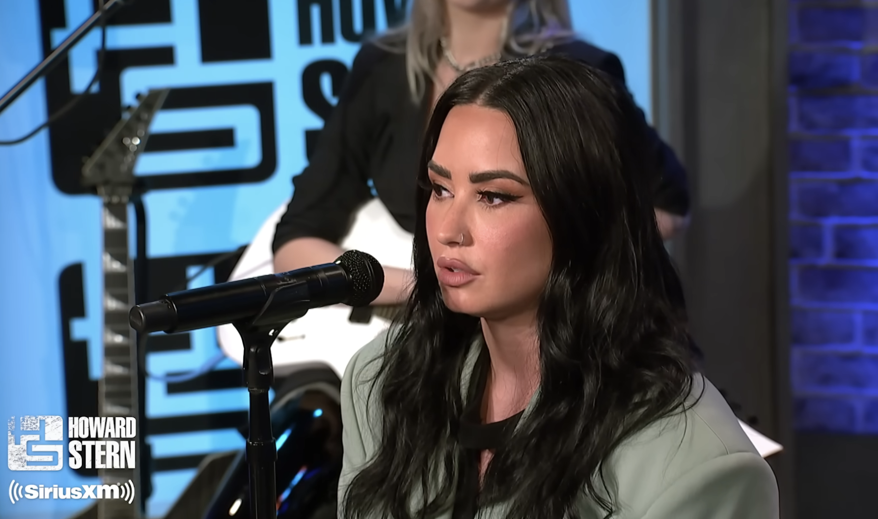 Close-up of Demi on the show