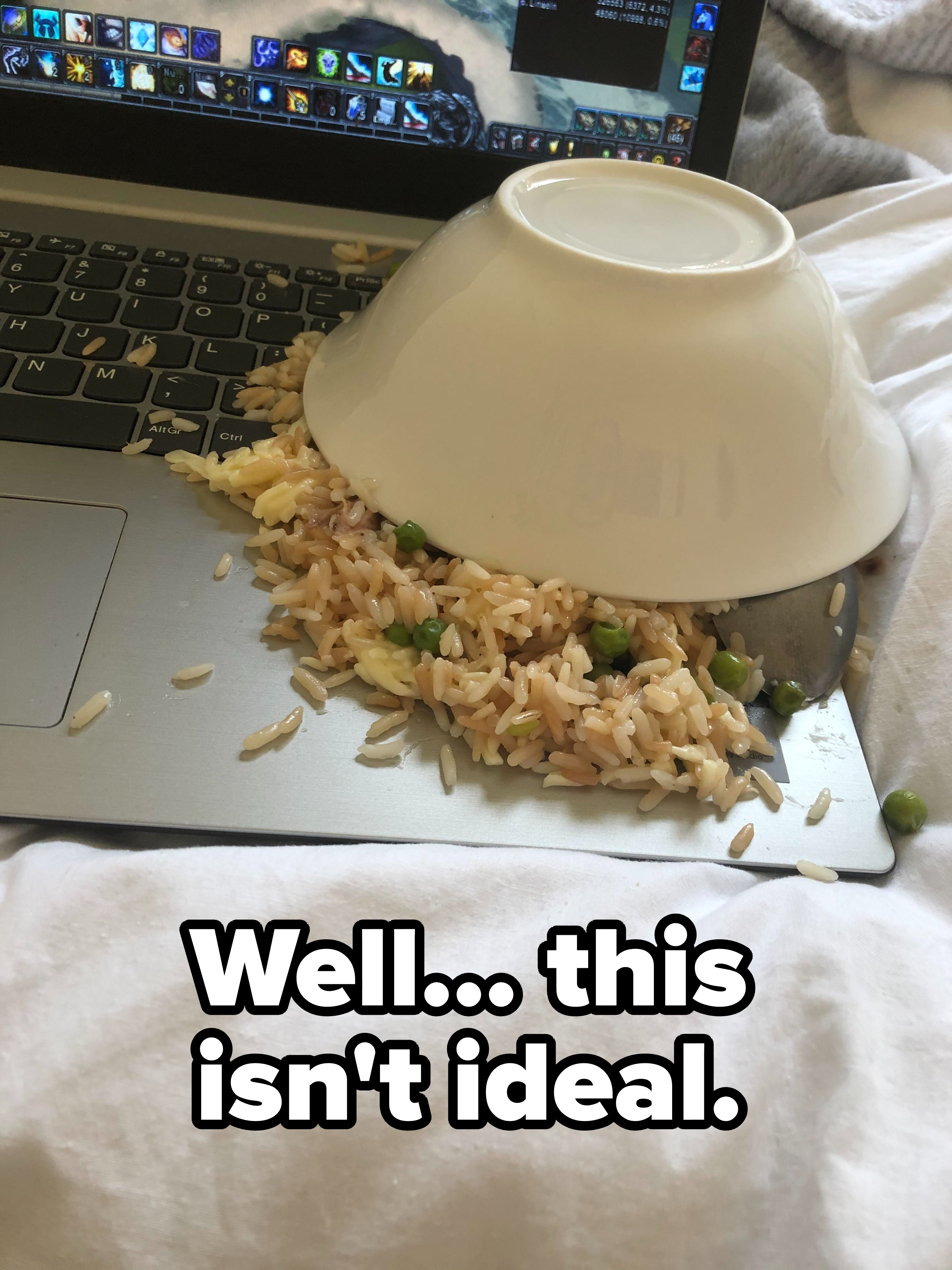 spilled rice on a computer