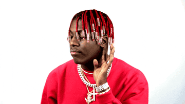 Lil Yachty shaking his head and turning a TV off