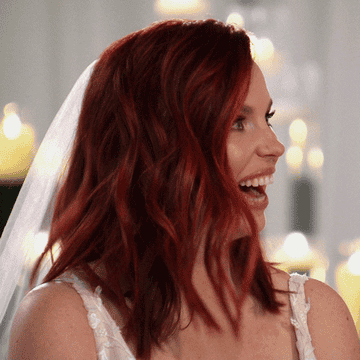 bride with her mouth open in shock