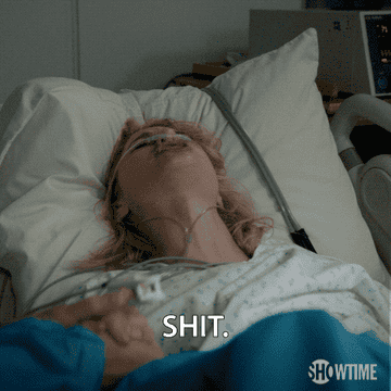 a woman painfully giving birth