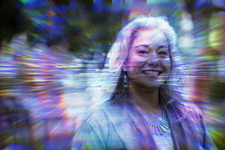 warped colorful photo of a woman smiling