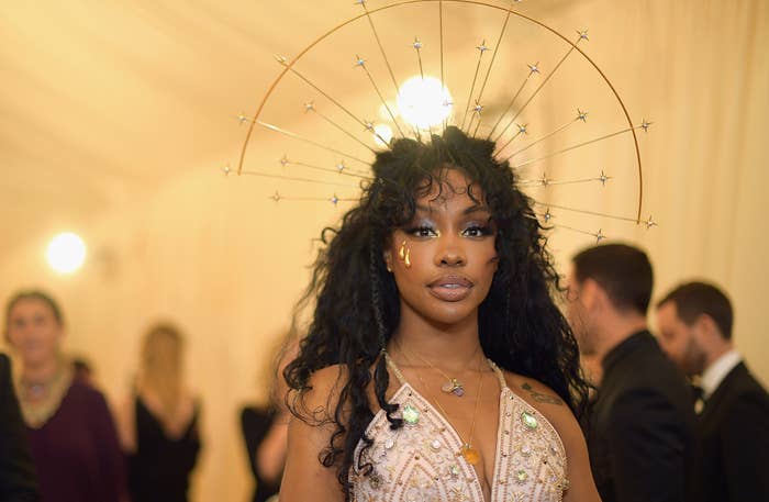 closeup of sza at a media event wearing a delicate headpiece