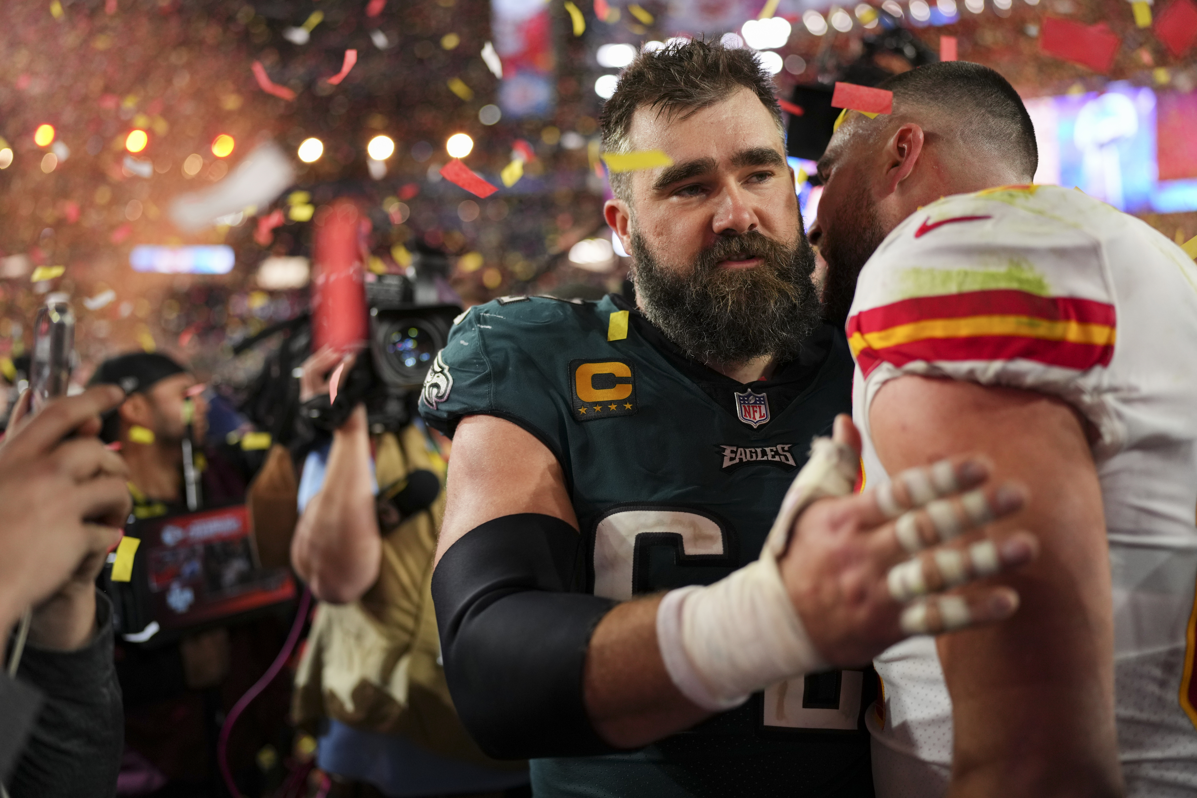 Jason embracing his brother, both in uniform