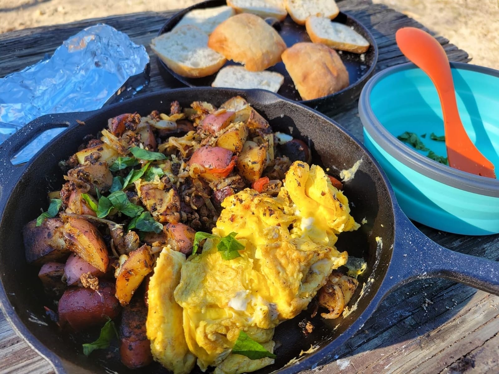 Reviewer&#x27;s photo of the skillet with an egg scramble and potatoes inside